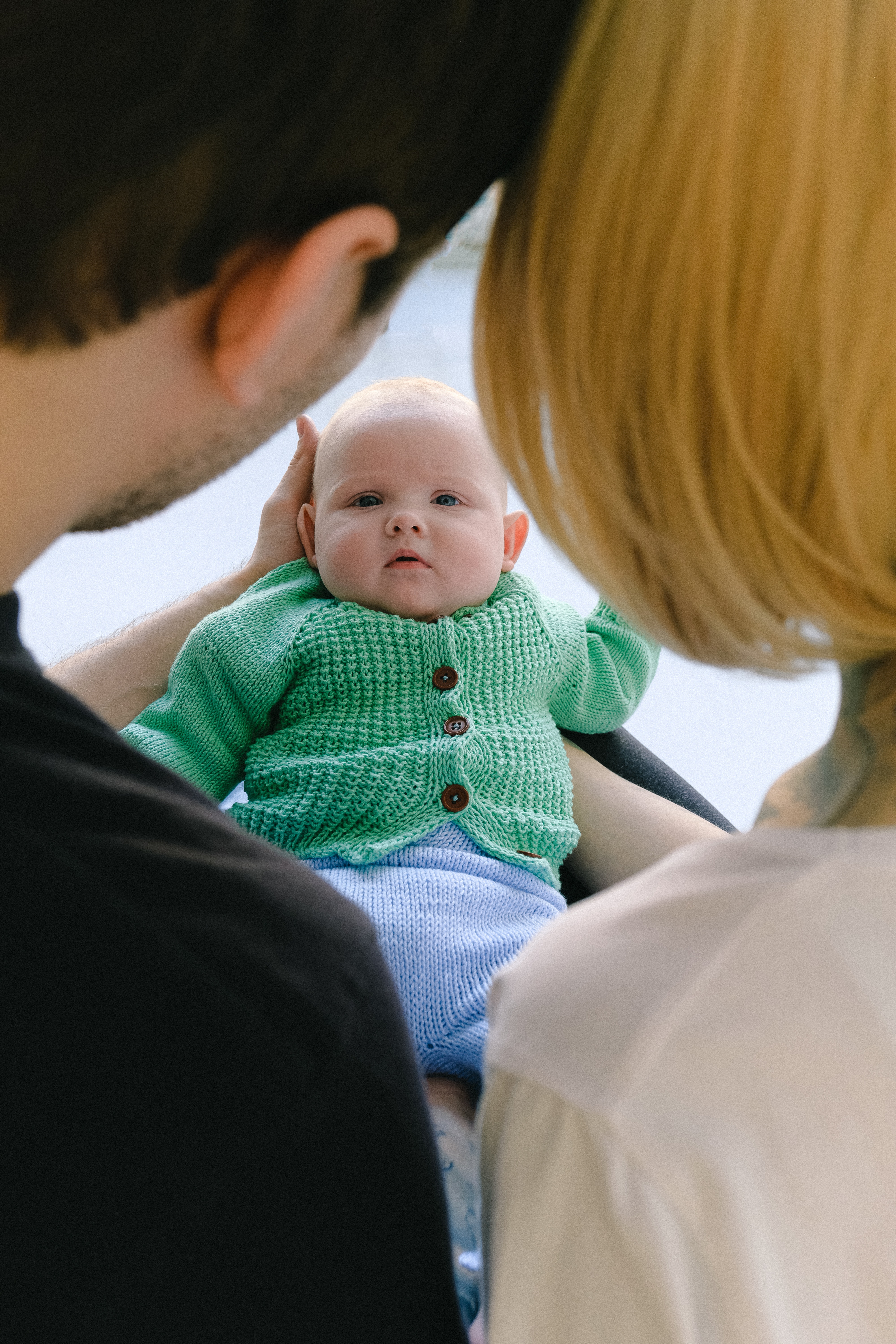 wtg parents holding baby