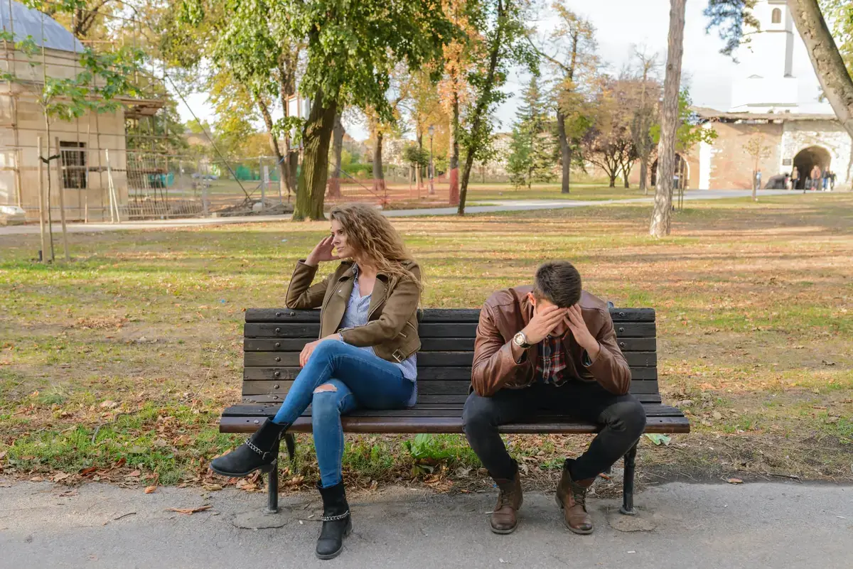 Distressed couple on a bench